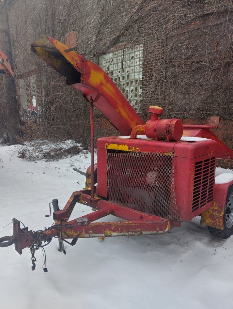 Kenwood Tree Service wood chipper equipment on site